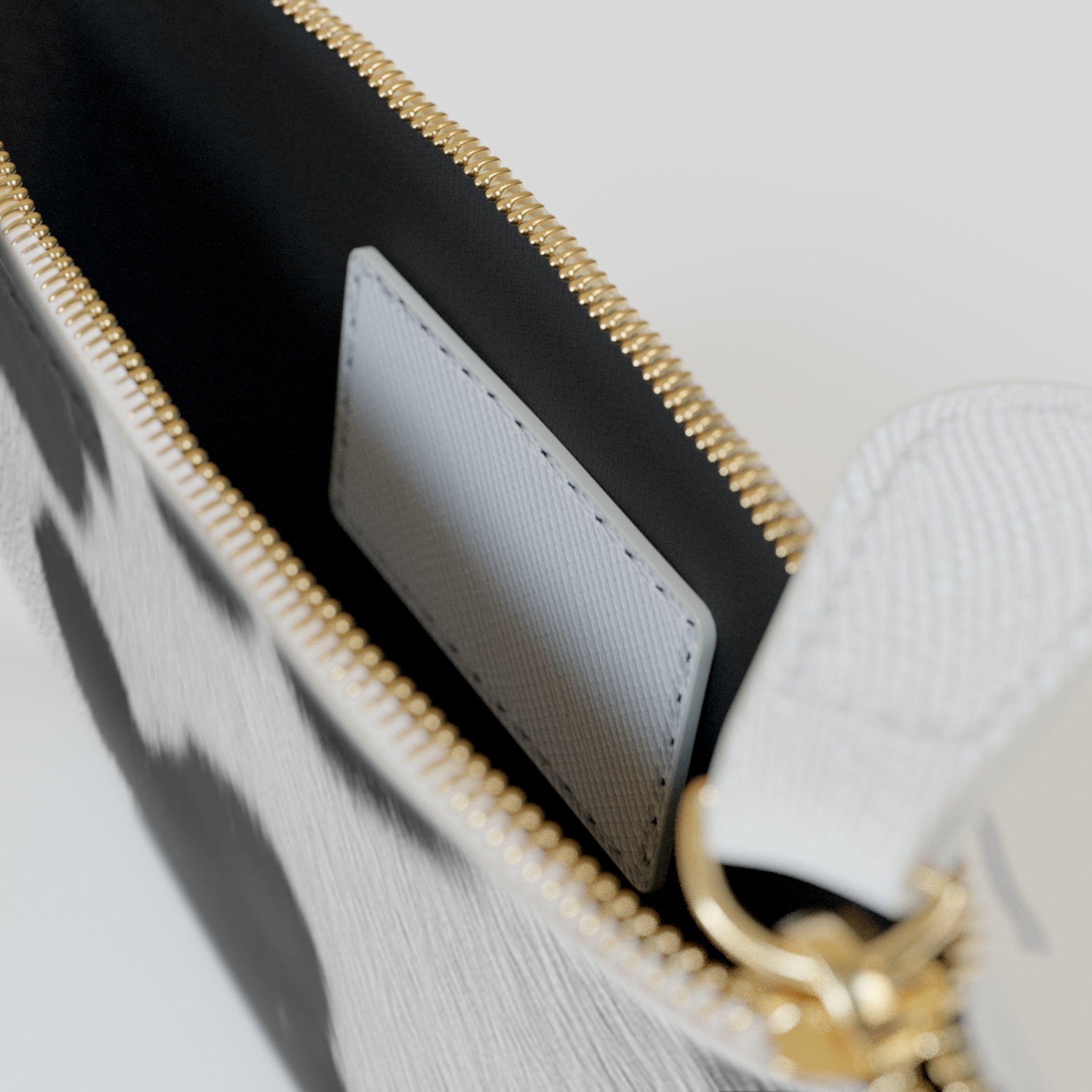 Cow Print Mini Clutch Bag — Black & White Faux Fur Pattern with Gold Logo