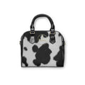 Cowhide Print Shoulder Handbag – Black & White Faux Fur Satchel