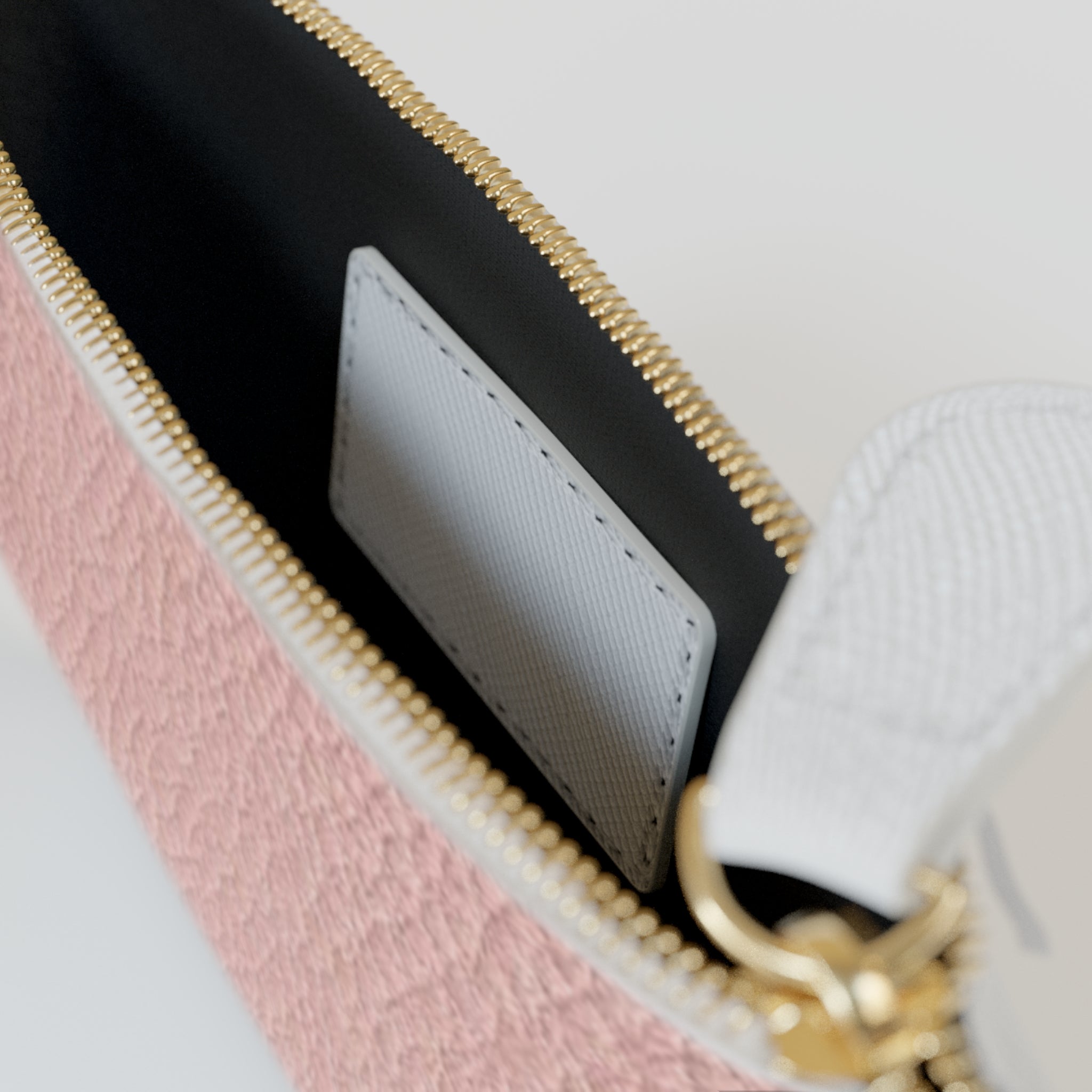 Pink Pebble Mini Clutch Bag — Compact Zipper Pouch with Gold Monogram Accent