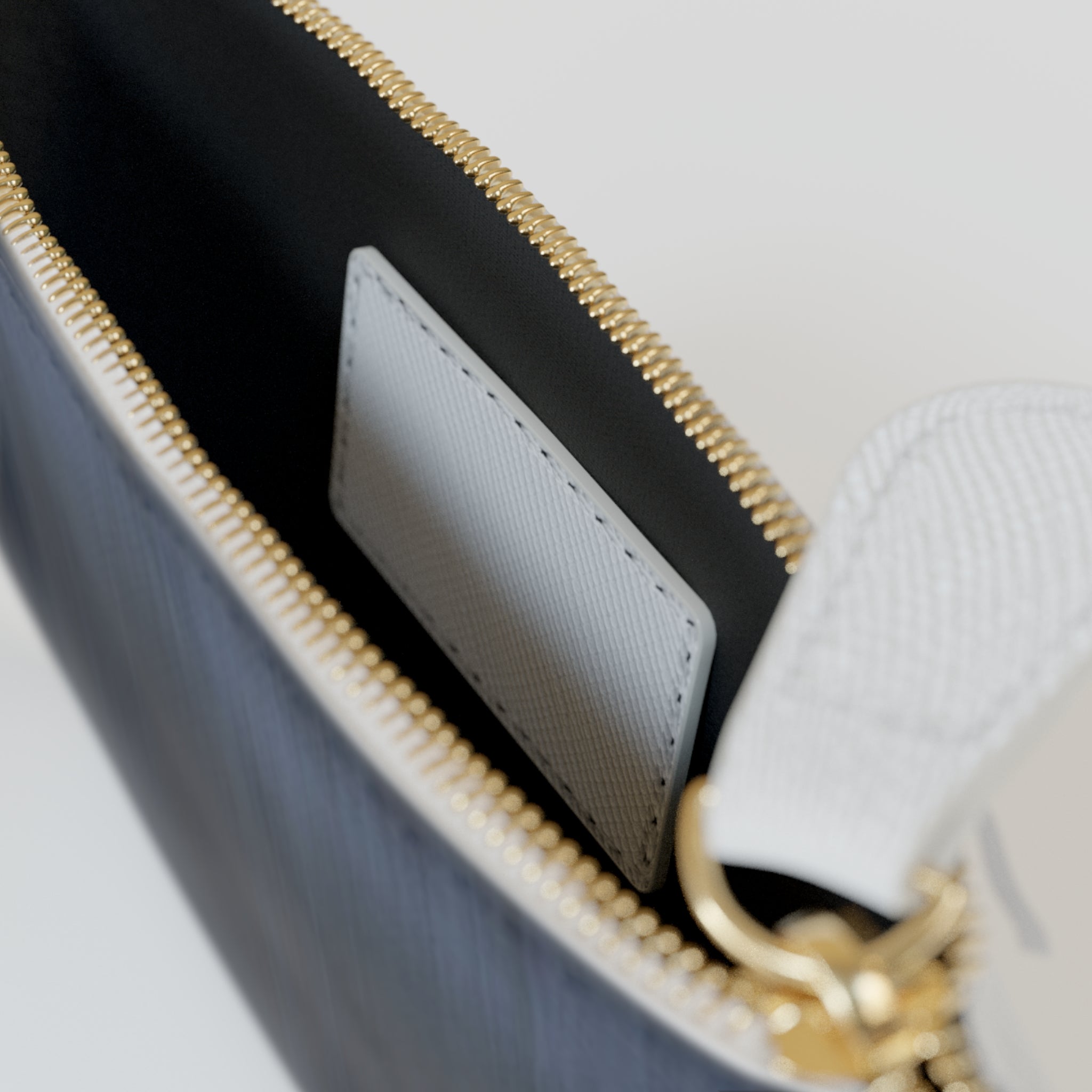 Noire Mini Clutch Bag — Elegant Black Zip Pouch with Gold Logo